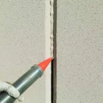 Tower Sealants AU-1 being applied to concrete joint